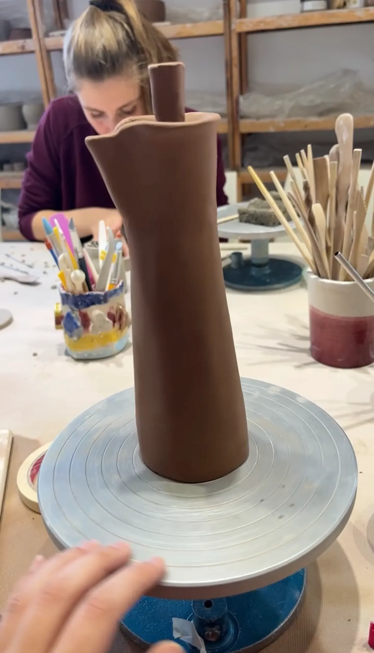 A ceramic piece by Lucía, drying on the wheel